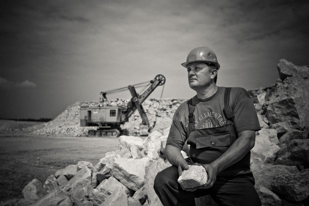 adult, construction, hard hat, man, mine, outdoors, rocks, uniform, vehicle, wear, work, worker, gray work, gray construction, gray rock, construction, hard hat, mine, mine, mine, mine, mine, worker